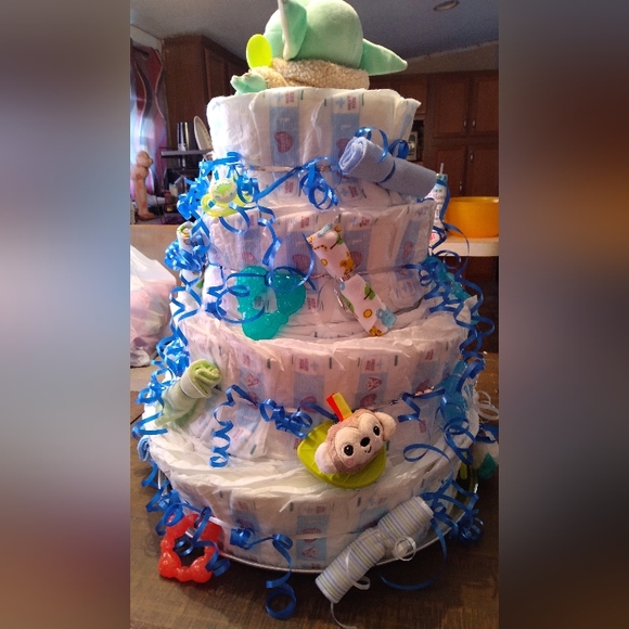 Hand made diaper cake with accessories attached - Picture 3 of 4